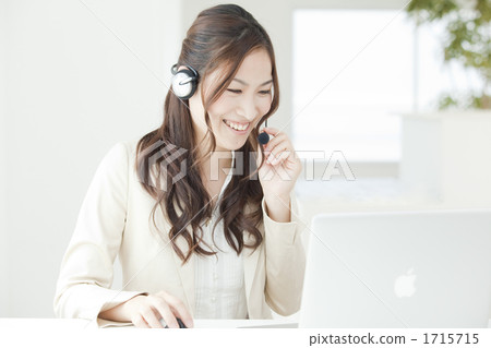 Business image Young lady playing headset Business image Young lady playing headset 1715715