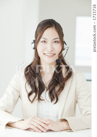 Business image Young lady playing headset Business image Young lady playing headset 1715716