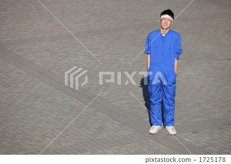 A young man wearing a goat 1725178