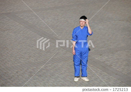 A young man wearing a goat 1725213