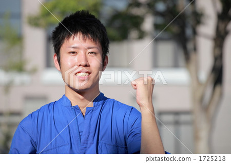 A young man wearing a goat 1725218