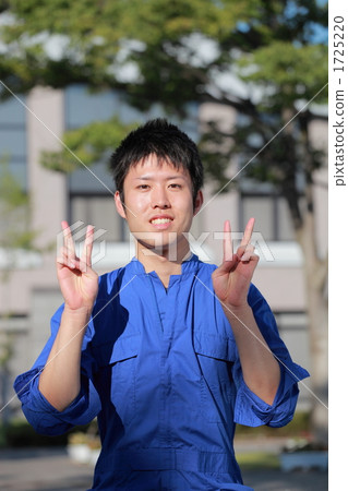 A young man wearing a goat 1725220