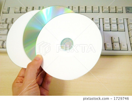 Hand with CD-ROM Hand with CD-ROM 1729746