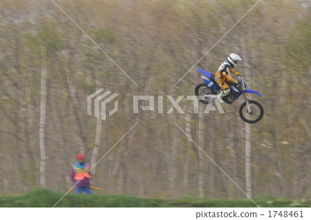 Jump flight of a motorcycle 1748461