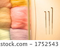 Wool and needle 1752543