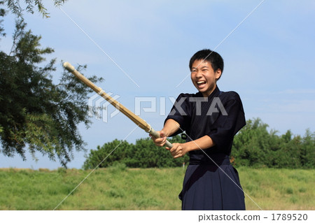A boy practicing kendo A boy practicing kendo 1789520