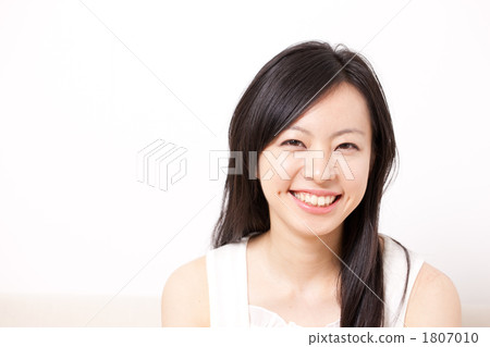 A young woman with a smile A young woman with a smile 1807010