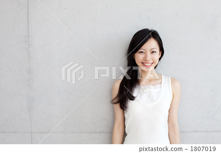 A smiling woman A smiling woman 1807019