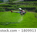 Unmanned helicopter spraying pesticide 1809913