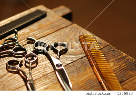 Beauty salon image, professional scissors and comb 1836983