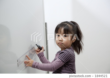 A girl drawing a line A girl drawing a line 1844521