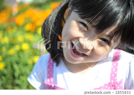 Smile in front of flowers 1855831