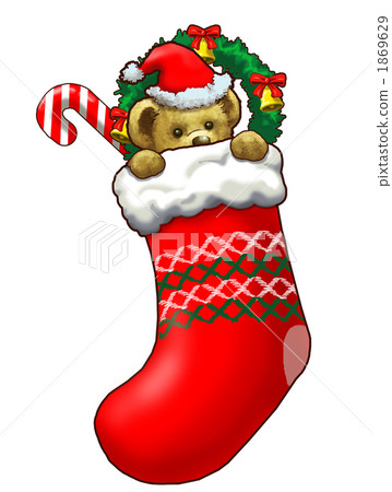 Teddy bear into Christmas socks 1869629