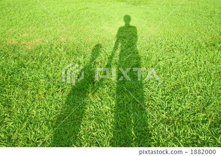 Parent and child shadow holding hands 1882000