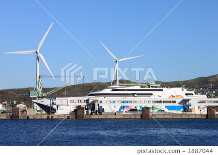 Car ferry and windmill 1887044