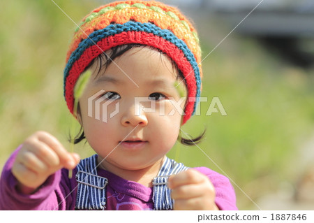 A girl walking along the levee 1887846