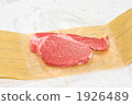 Beef steak fillet of a meat shop wrapped in wood 1926489