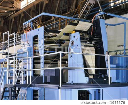 Rotating printing machine spinning paper roll 1955376