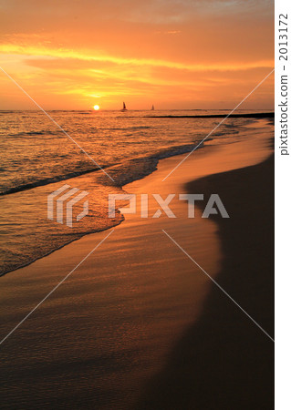 Sunset and sandy beaches and sailboats Sunset and sandy beaches and sailboats 2013172