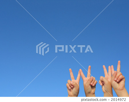 Clear blue sky and hands of children Clear blue sky and hands of children 2014972