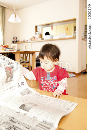 Baby reading newspaper 2030199