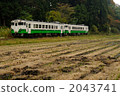 Dashi car going through the autumn Tadami line 2043741