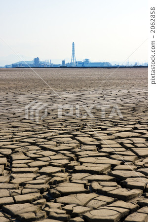 Cracked earth and factory 2062858
