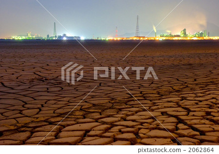 Cracked earth and factory night view Cracked earth and factory night view 2062864