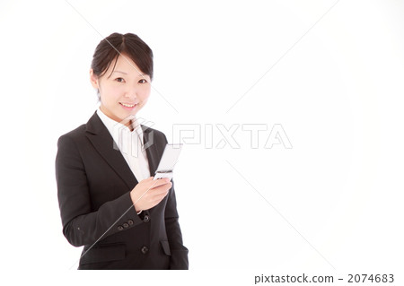 Business woman looking at mail 2074683