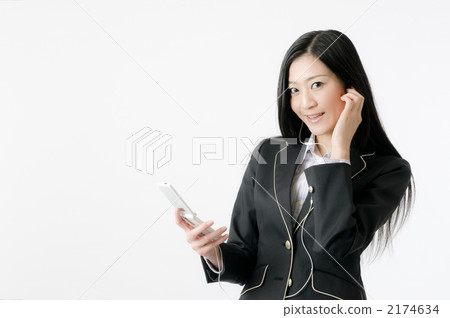 Smartphone music female employee Smartphone music female employee 2174634