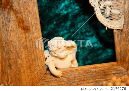 Angel peeking through the window Angel peeking through the window 2176276