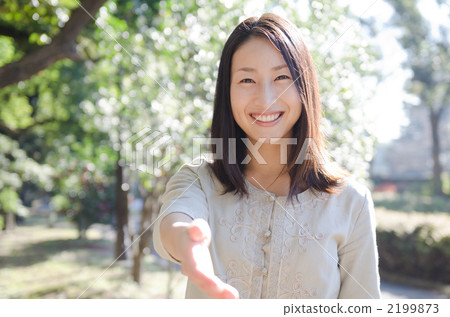 Smiling woman in her twenties (outdoor) Smiling woman in her twenties (outdoor) 2199873