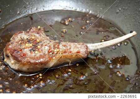 Lamb meat during cooking 2263691