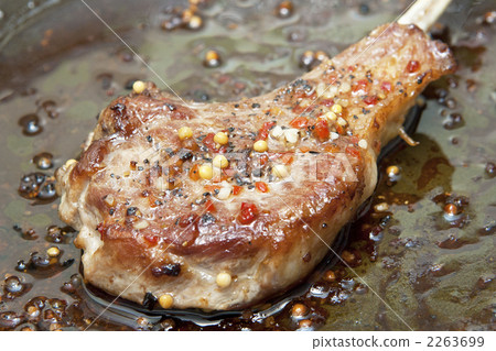 Lamb meat during cooking Lamb meat during cooking 2263699