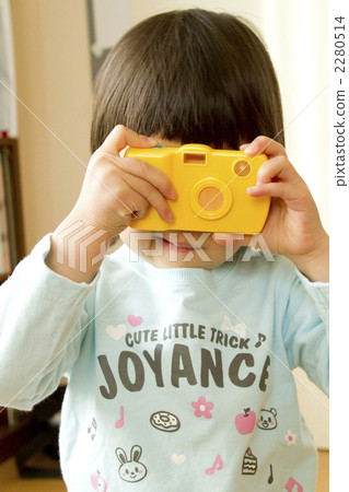 Girls playing with camera Girls playing with camera 2280514