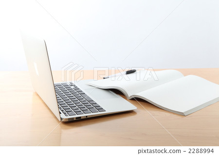 Laptop and notebook on the table Laptop and notebook on the table 2288994