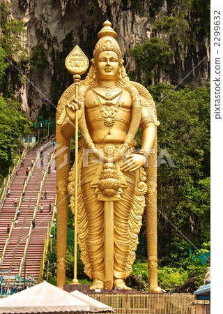The statue of the huge "Murgan god" of Batu cave (Kuala Lumpur / Malaysia) The statue of the huge "Murgan god" of Batu cave (Kuala Lumpur / Malaysia) 2299632