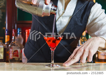 Bartender making cocktail 2312885
