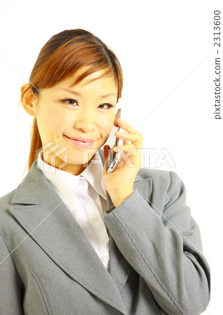 Business woman talking on mobile phone Business woman talking on mobile phone 2313600