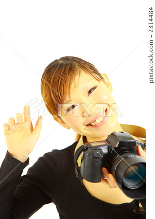 A woman taking a picture A woman taking a picture 2314484