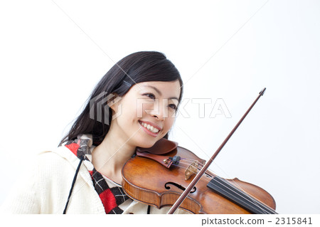 A woman playing the violin A woman playing the violin 2315841