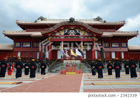 Shuri Castle and the back of a man wearing a Ryukyu costume 2342339