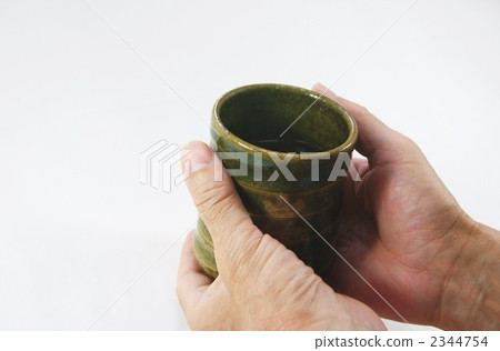 Senior hand with a sprinkle 2344754