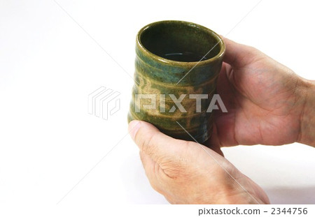 Senior hand with a sprinkle 2344756