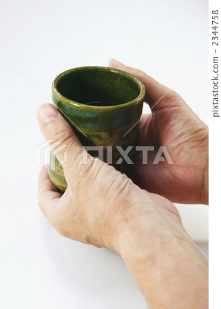 Senior hand with a sprinkle 2344758