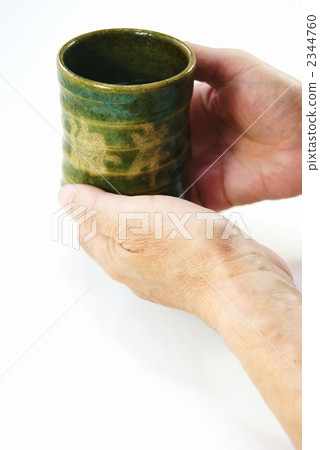 Senior hand with a sprinkle 2344760