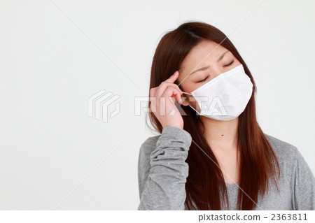 woman wearing a mask woman wearing a mask 2363811