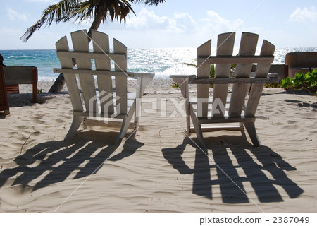 [Mexico] Chairs overlooking the Caribbean Sea from the Caribbean town of Tulum and sandy beaches 2387049