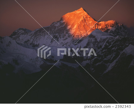 Makaru peak stained red (8463 m) From Mela Peak High Camp just before sunset 2392343