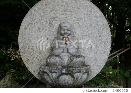 Stone Buddha statue girl front 2400950